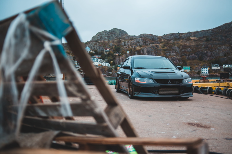 outdoors, automobile, black, motor vehicle, canada, built structure, st. johns, caravan, trailer truck, sports car, leisure activities, no people, day