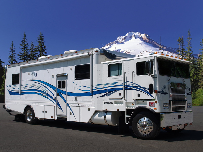 stationary, day, land vehicle, communication, campers, mobilehouse, outdoors, mountain, bus, snowcapped mountain, blue, white color, snow, sky, no people