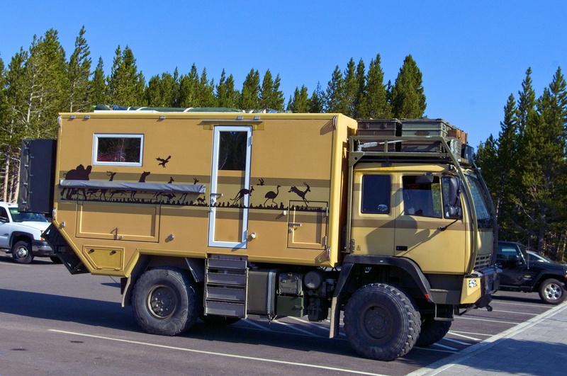 journey, expedition camping vehicle, camper, rv, offroad, city, tree, day, nature, road, recreational, land vehicle, motorhome, plant, sunlight, no people