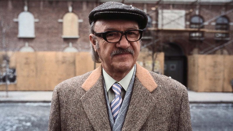 one person, males, outdoors, building exterior, actor, architecture, city, focus on foreground, portrait, front view, standing, looking at camera, adult