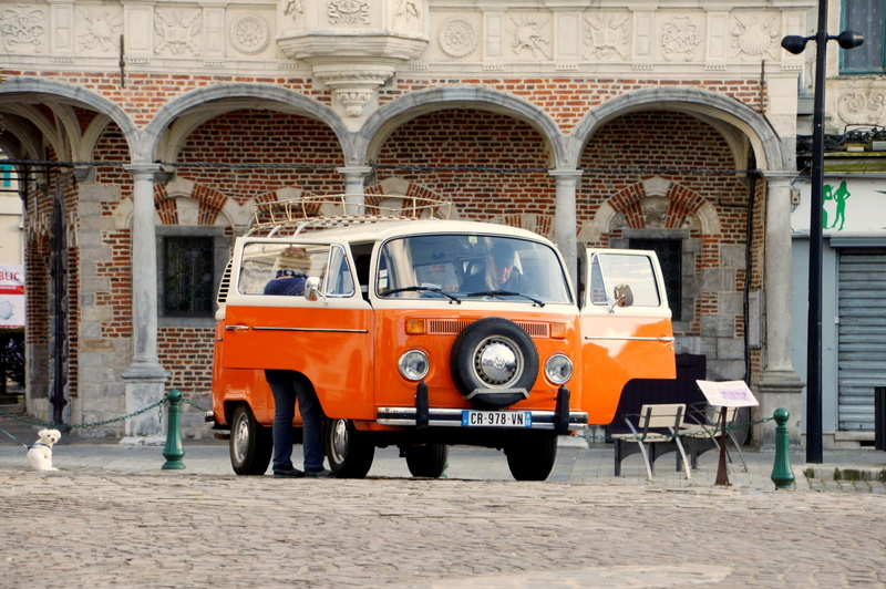 retro, automobile, vintage, bus, land vehicle, built structure, outdoors, camping, street, city, text, day, nostalgic, travel, hippie, car, camper, motor vehicle