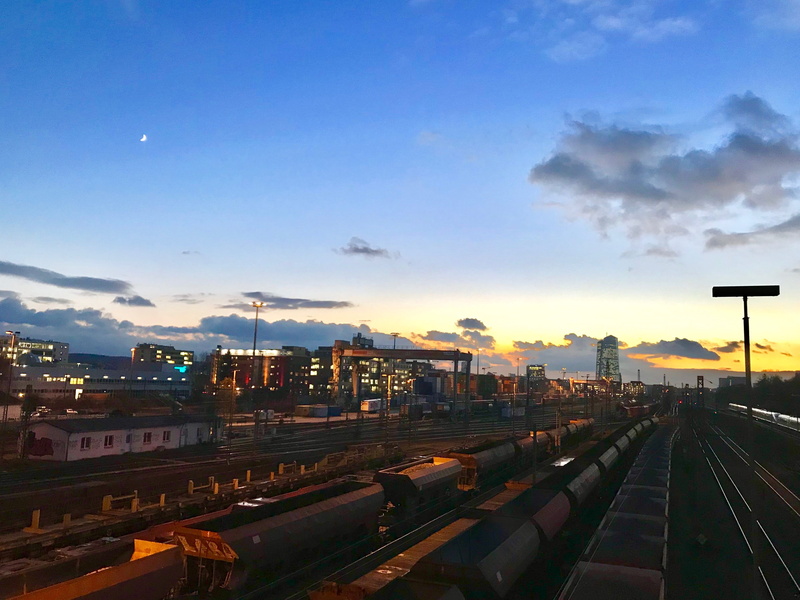cloud, route, traffic, public transportation, car, blue, rail, cityscape, transportation, outdoors, train, railroad station, built structure, rails, architecture