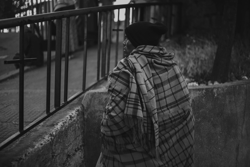 lifestyles, addisbaba, day, standing, social issues, railing, views, streetlife, addis ababa, men, ethiopia, architecture, three quarter length, clothing