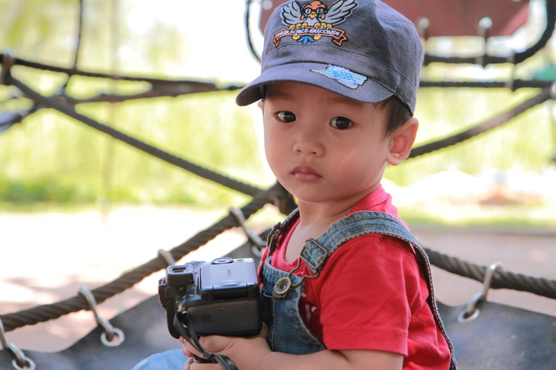 people, day, lifestyles, portrait, child, males, looking at camera, streetlife, cute, leisure activity, focus on foreground, real people, innocence, close-up