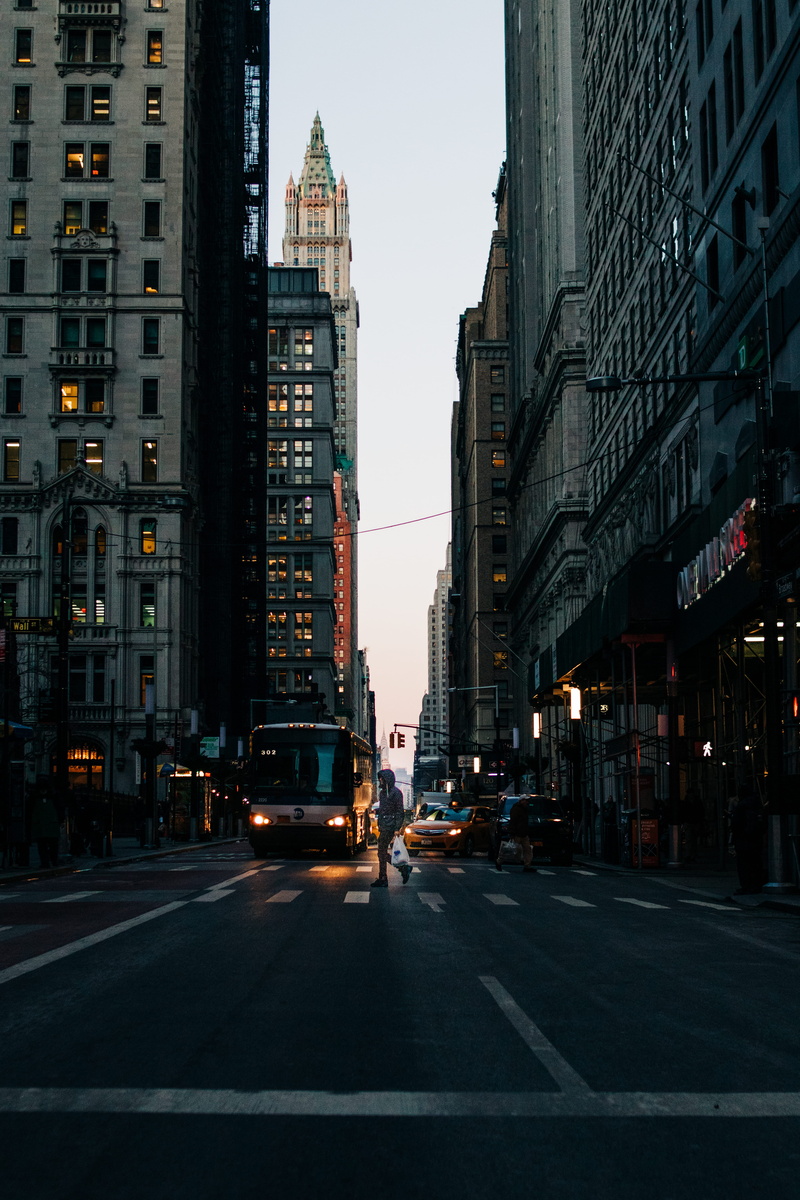 illuminated, outdoors, mode of transportation, city life, surrounded, downtown, nature, tarmac, urban, building exterior, rise, office building exterior