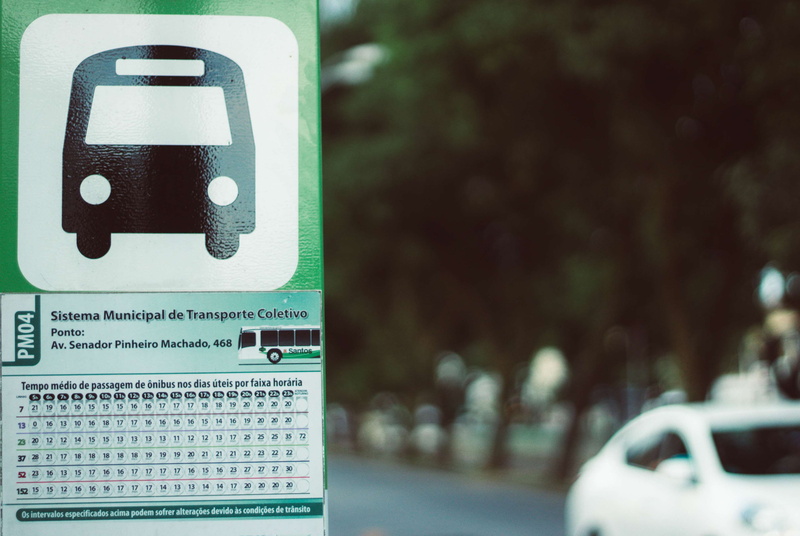 still life, hour, focus on foreground, text, nature, taxi, city, built structure, tree, number, outdoors, selective focus, architecture, sign, buses, point