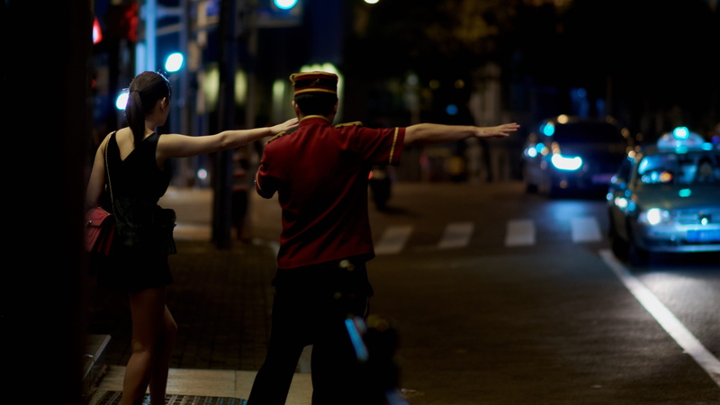 stop, human limb, night, transportation, 4K, two people, taxi, full length, car, standing, street, focus on foreground, architecture, hotel, limb, rear view