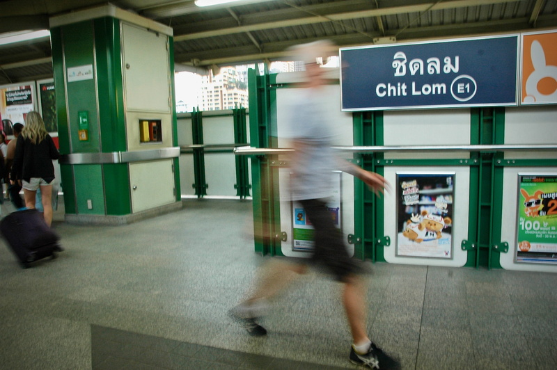 speed, door, rail transportation, motion, city, bus stop, postal office, mode of transportation, turnstile, on the move, railroad station, near, pedestrian