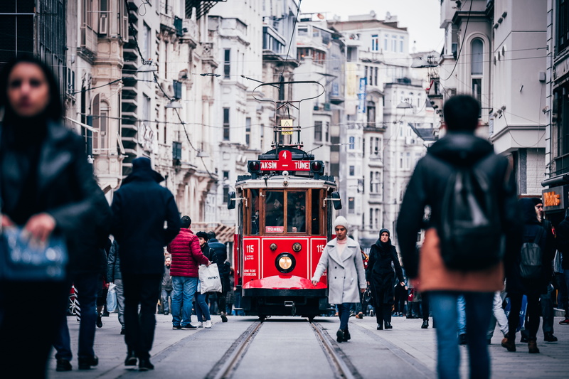 men, city, transporation, outdoors, city street, cold, track, street, building exterior, mode of transportation, trolly, bus, streetcar, real people, adult