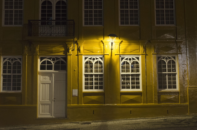 street light, built structure, facade, no people, lighting equipment, residential district, door, windows, building exterior, light - natural phenomenon