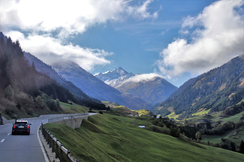 mountain range, bow, street, land vehicle, transport, view, cloud - sky, the prospect of, car, scenics - nature, clouds, transportation, beauty in nature