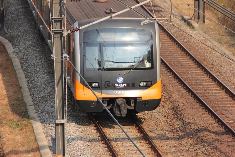 outdoors, train - vehicle, commuting, no people, passenger, high angle view, railroad car, rail transportation, arrival, bus, day, republic of korea, shipping