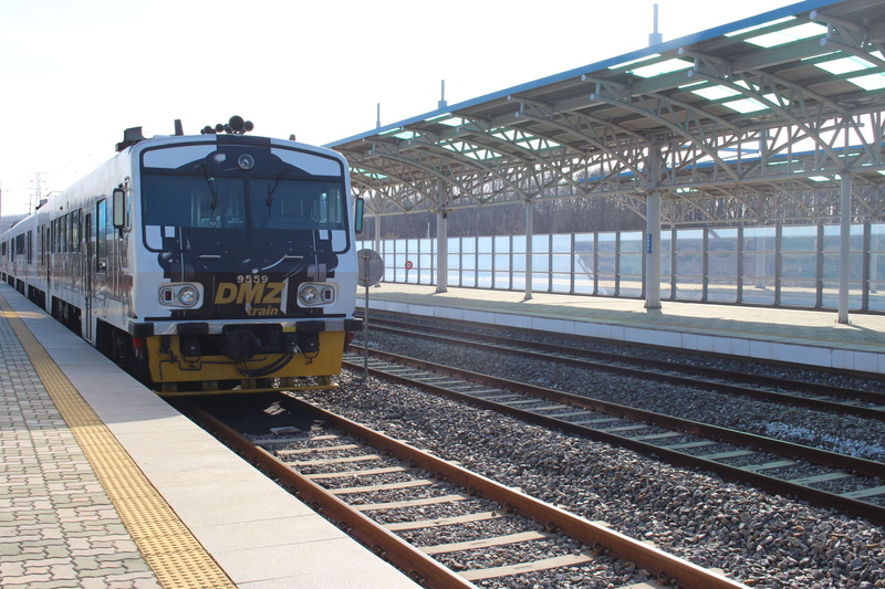 arrival, railroad station platform, railroad track, sunlight, station, travel, nature, train station, 4K, public transportation, no people, rail transportation