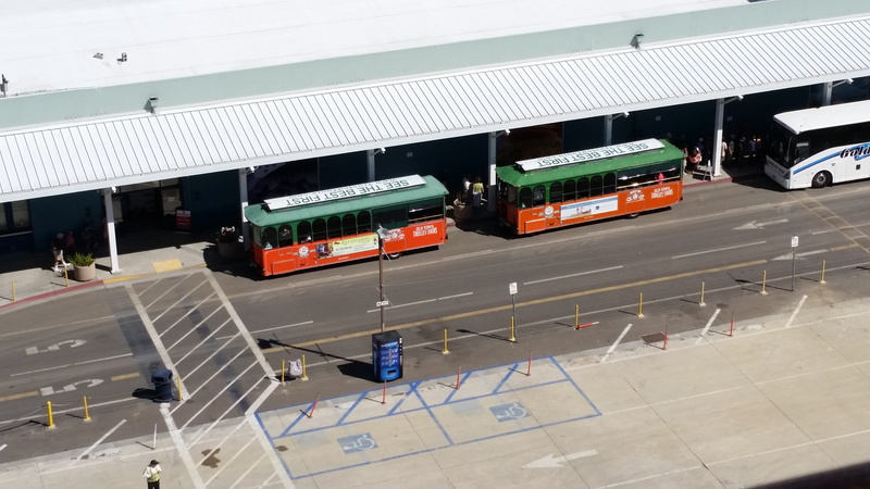land vehicle, outdoors, mode of transportation, public transportation, public, travel, built structure, transportation, tramway, road, bus, street, motion