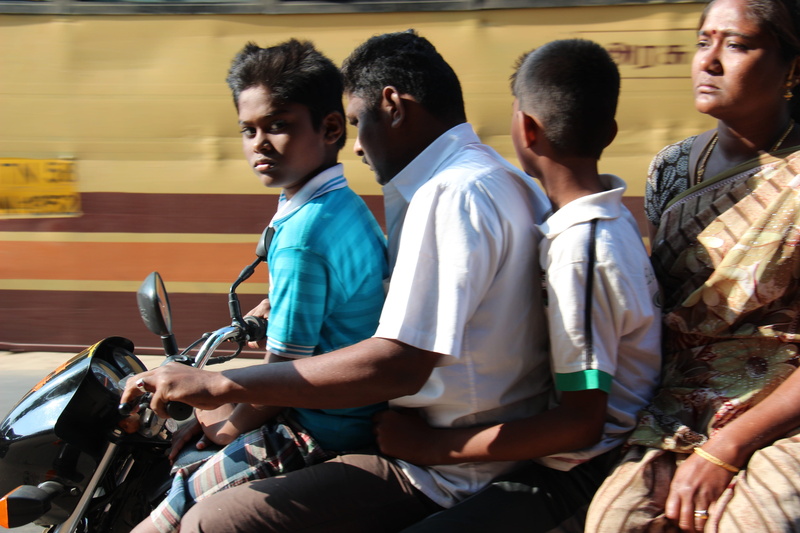 three quarter length, adult, people, young men, black, man, leisure activity, sitting, everyday life, outdoors, sport, transportation, woman, men, real people