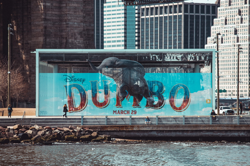 representation, person, building, poster, vehicle, vessel, advertisement, built structure, animal wildlife, dumbo, animal, animal themes, statue, brick