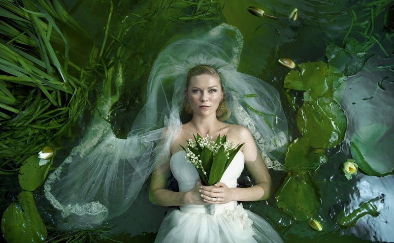 looking at camera, nature, beauty, kirsten dunst, 2011, outdoors, portrait, young adult, melancholia, fashion, film, adult, young women, s, wedding, beautiful woman