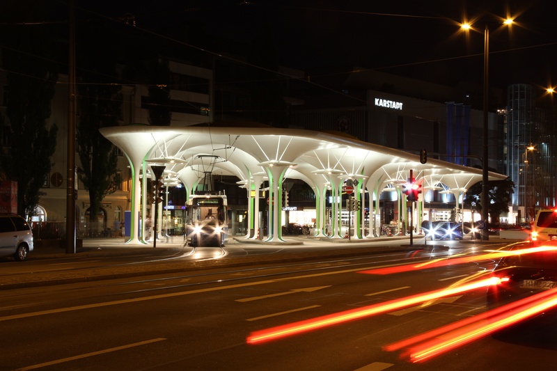 street, illuminated, traffic, mode of transportation, built structure, speed, modern, city life, 2K, night, stop, blurred motion, building exterior, light trail