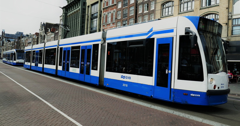 holland, city life, building exterior, traffic, motion, electric transport, rail, travel, train car, 5K, day, incidental people, outdoors, building, passengers