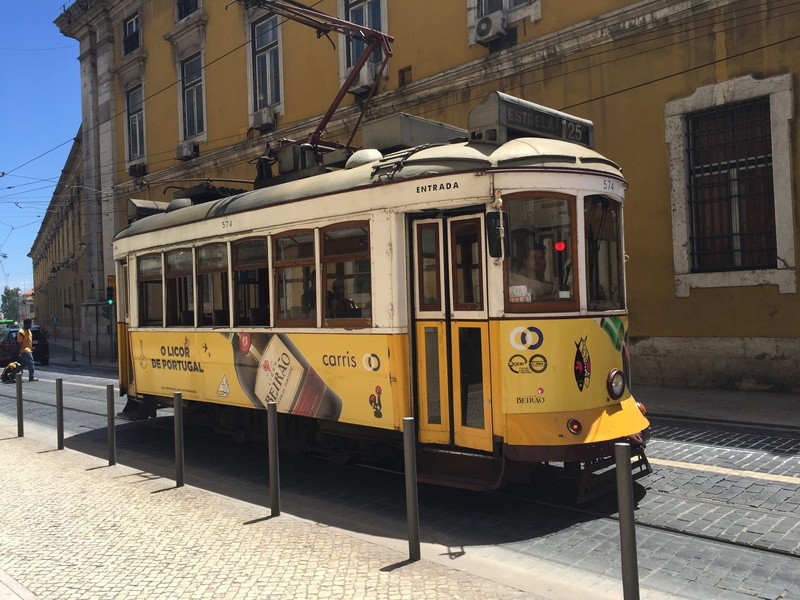 sunlight, transport, railroad track, tram, seemed, lisboa, traffic, nostalgia, 1080P, incidental people, lisbon, old, land vehicle, outdoors, nature, built structure