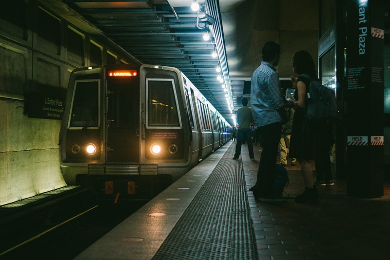 transportation, man, wearing, night, real people, arrival, platform, men, person, two people, station, travel, passenger, architecture, city, black, full length