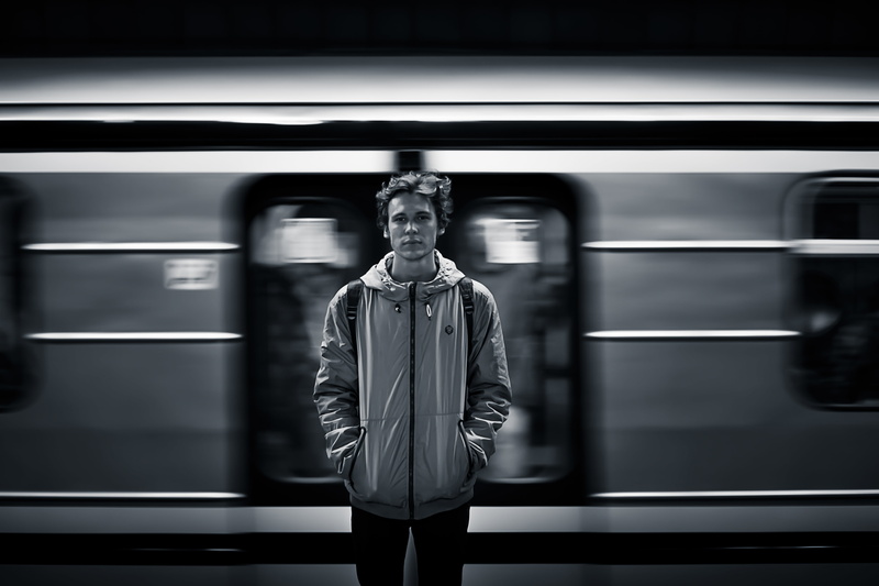 underground, black and white, subway train, man, three quarter length, railroad station, speed, train, public transportation, motion, photo, grayscale