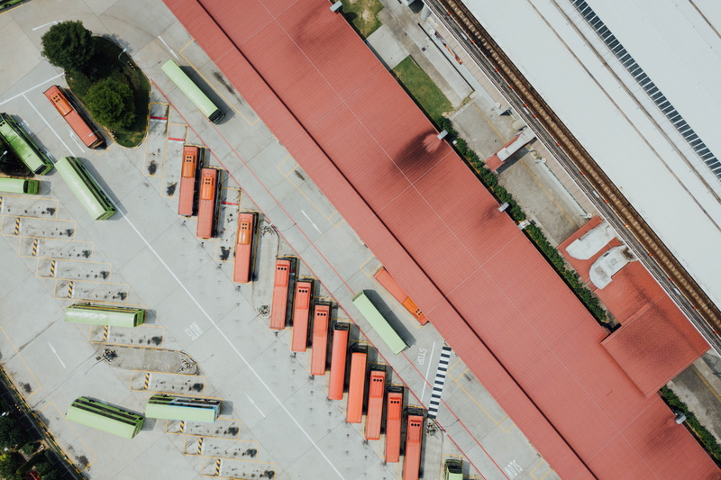 city, parking lot, parking space, bus station, asia, traffic, outdoors, bus, building Exterior, transportation, architecture, editorial, car, busses, people