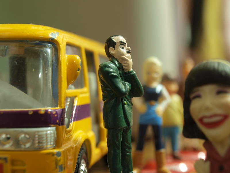 transportation, yellow, miniature, waiting, man, photography, male likeness, john cleese, bus, incidental people, station, female likeness, monty python