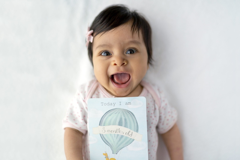 happiness, human, infant, innocence, looking at camera, toddler, females, smile, face, card, casual clothing, apparel, months, positive emotion, laughing