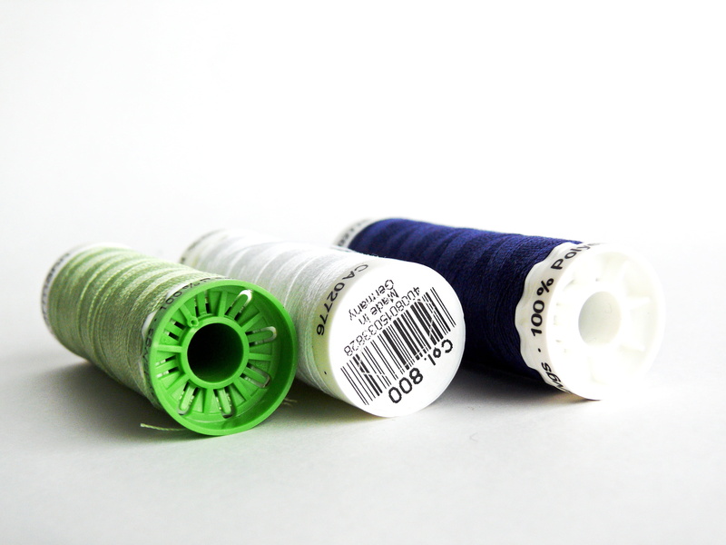 text, green color, western script, patch, sew, needle and thread, yarn, sewing thread, finance, tailoring, choice, no people, white background, number