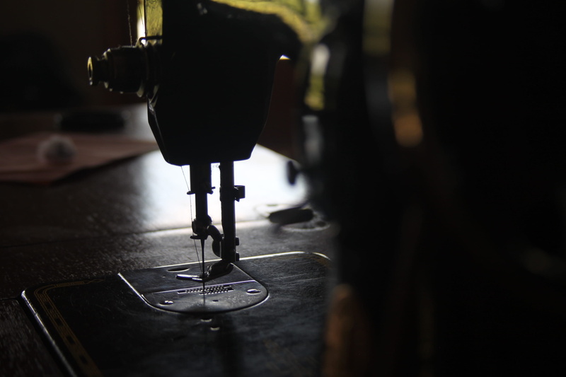 selective focus, tailor, treadle, sewing needle, machine part, machinery, stitch, black, business, industry, craft, equipment, close-up, factory, textile
