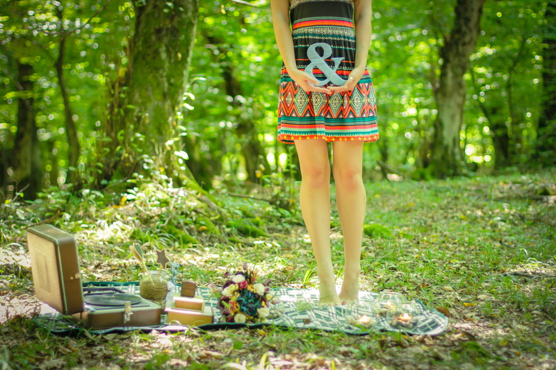 grass, people, hands, land, bouquet, women, tree, woman, person, daytime, day, girl, holding, legs, young women, fashion, emotion, standing, blanket, nature