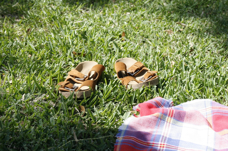 green color, personal perspective, human body part, body part, blanket, picnic, shoe, real people, shoes, sandal, outdoors, lawn, high angle view, human foot