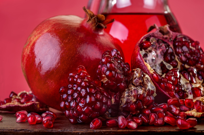 studio shot, vegetarian Food, pomegranate, garnet, still life, table, sweet Food, focus on foreground, freshness, organic, sliced, food, gourmet, group of objects