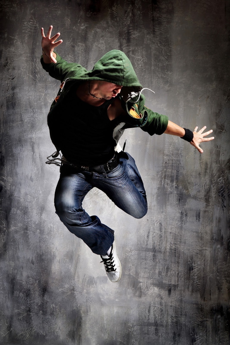 indoors, jeans, dancing, body part, full length, human body part, motion, mid-air, limb, human arm, males, young adult, jumping, smoke - physical structure
