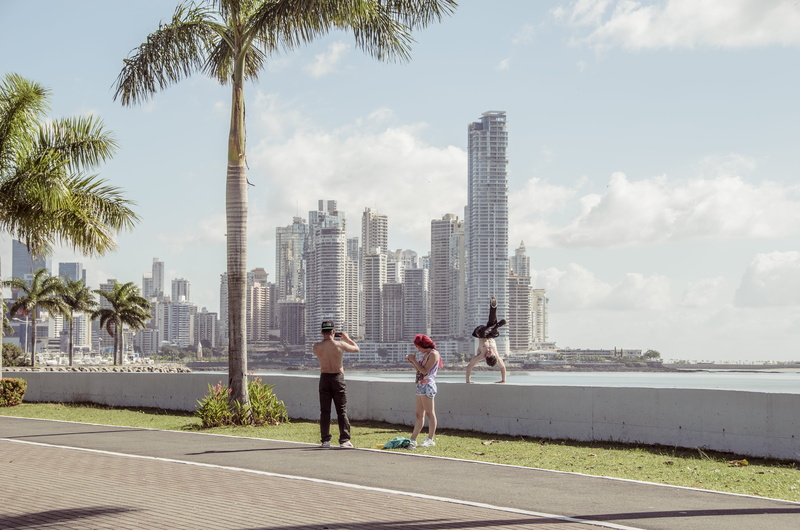 cloud - sky, men, skyline, adult, built structure, real people, office building exterior, two people, plant, skyscraper, palm, nature, sky, panama, outdoors