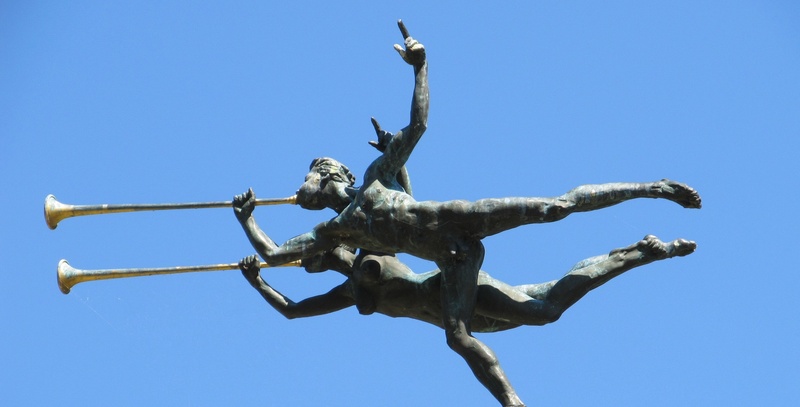 animals in the wild, trumpeter, tree, outdoors, no people, figures, sculpture, patina, ornaments, day, blue, heralds, vertebrate, clear sky, nature, plant