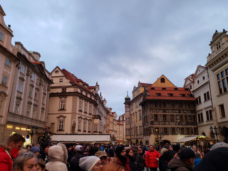 city life, sky, festival, architecture, city, the old town, real people, group of people, plaza, town square, building, day, men, building exterior, built structure