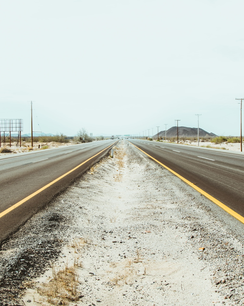 mexico, architecture, transportation, surface level, empty, empty road, diminishing perspective, sky, heat, nature, median, cars, parallel, crossing, clear sky