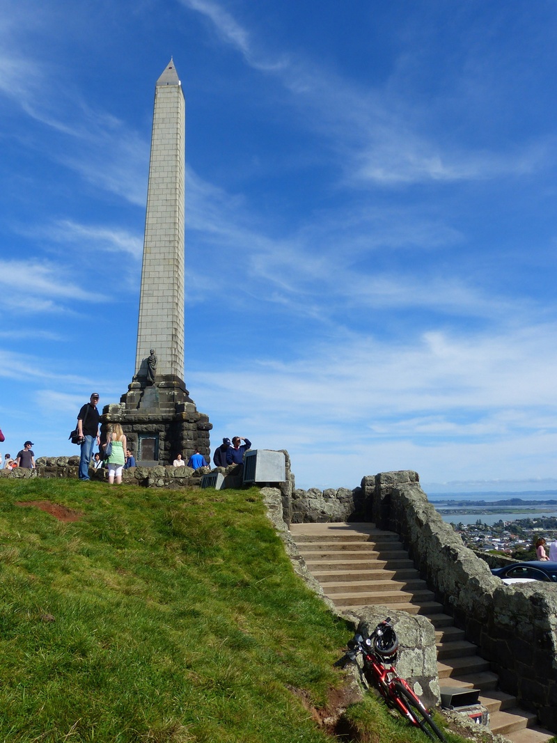 built structure, cloud - sky, maori, real people, incidental people, outdoors, architecture, sky, nature, architectural column, city, the past, hill, tall - high