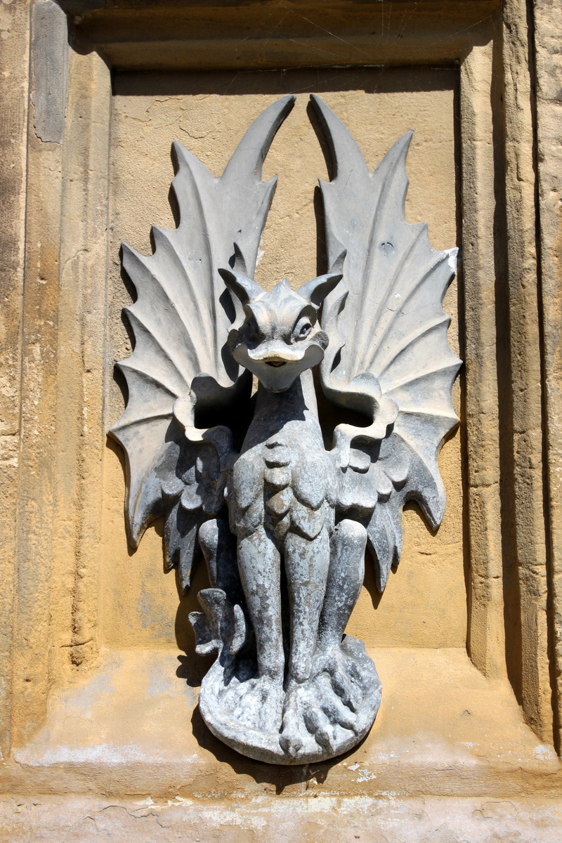 creativity, belief, sunlight, sculpture, no people, creature, gray, carving, mythical, religion, old, angel, day, wall - building feature, craft, statue