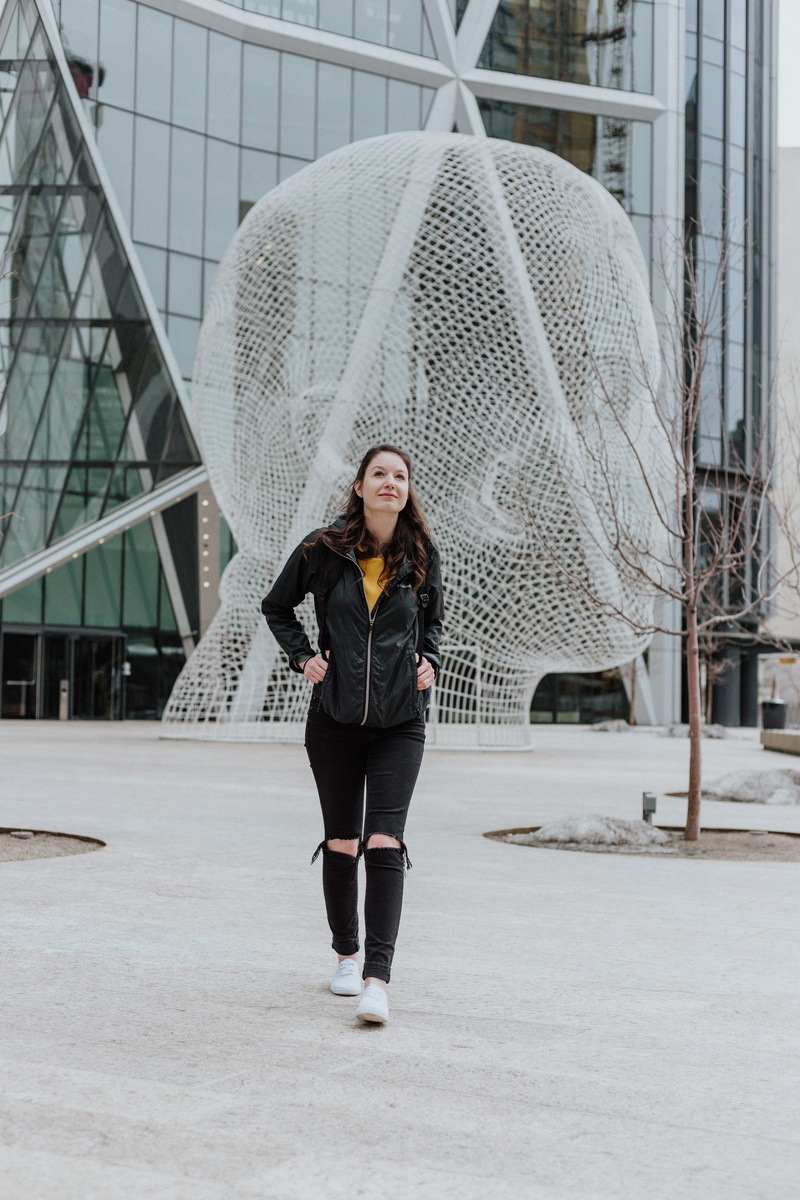 scarf, jacket, woman, ground, clothing, besided, 5K, near, statue, head, gray, building, young women, beautiful woman, concrete, young adult, full length