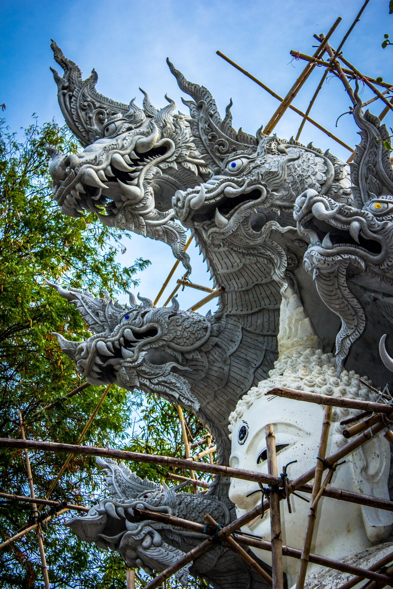 concrete, buddha, background, outdoors, art and craft, design, ancient, symbol, craft, low angle view, built structure, worship, day, sculptures, no people