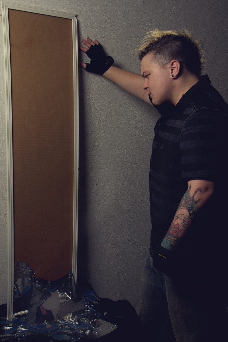 young, real people, model, male, young men, indoors, casual clothing, leisure activity, looking, man, person, males, shatter, white, sadness, mirror, broken