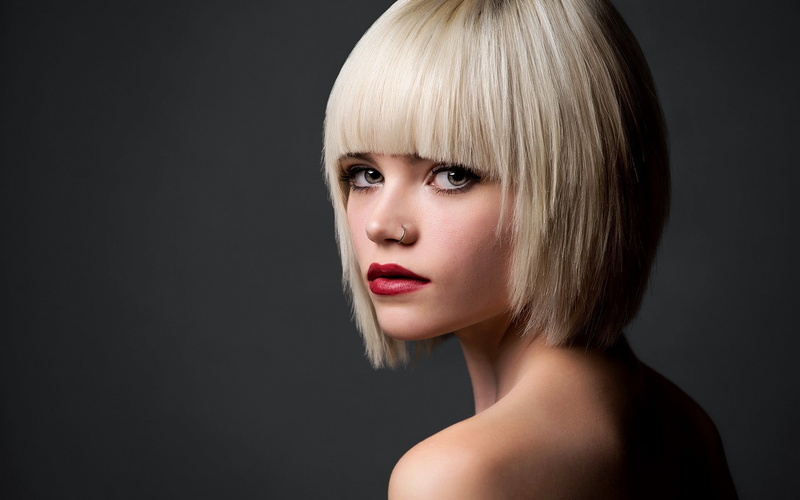 headshot, short hair, human lips, adult, eyeshadow, glamour, looking at camera, human hair, fashion model, make-up, indoors, bangs, simple background, lipstick