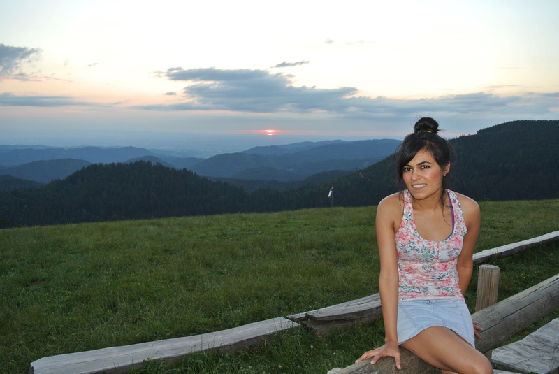 smiling, brunette, women, 1080P, tank top, hairbun, sitting, women outdoors, denim skirt