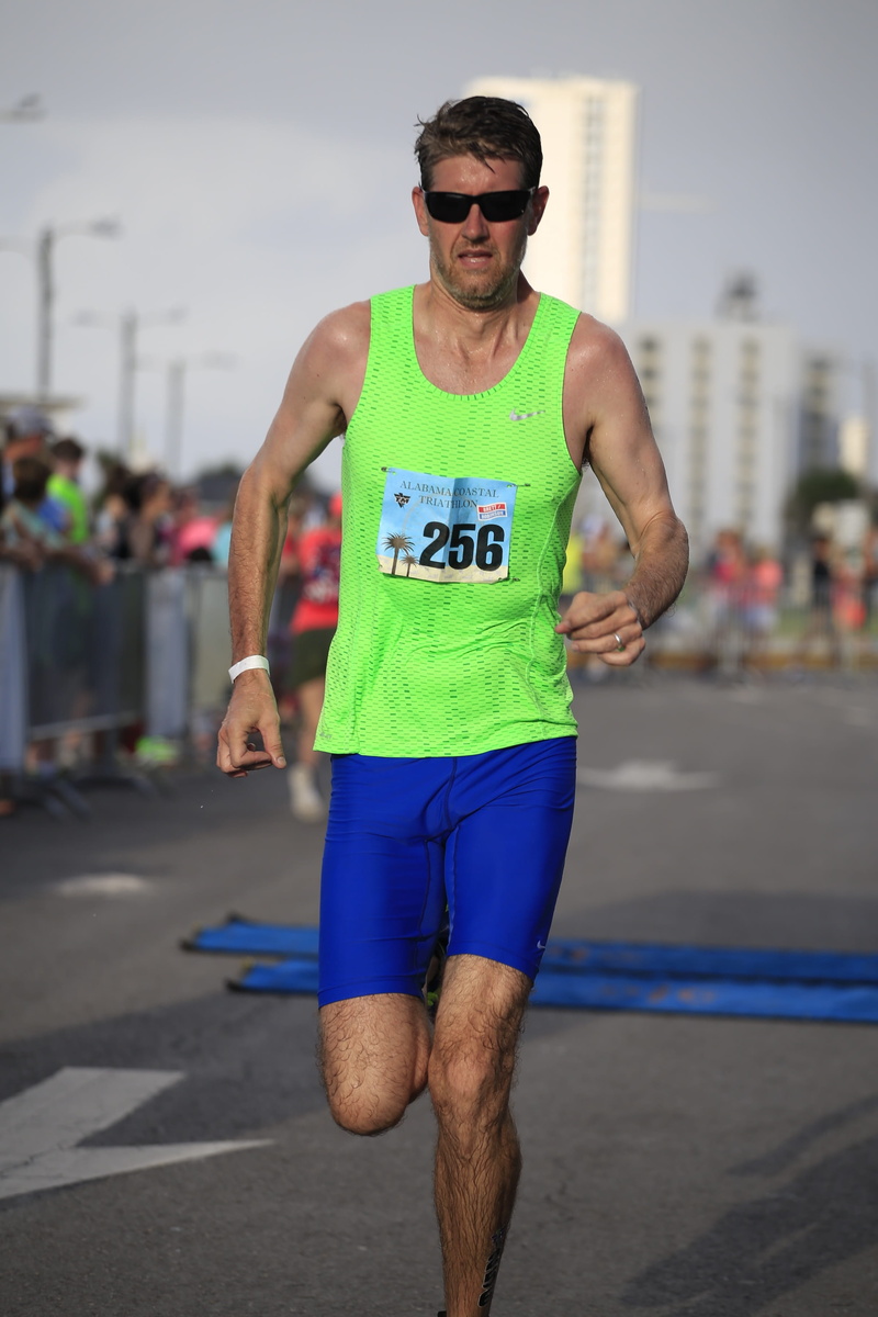 swim, three quarter length, only men, sportsman, day, Marathon, muscular Build, fast, focus on foreground, sport, fitness, run, front view, cyclist, race