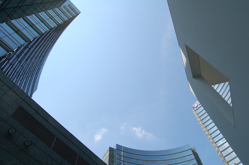 building exterior, skyscraper, office, built structure, piazza gae aulenti, blue, building, sunlight, directly below, nature, travel destinations, cloud - sky