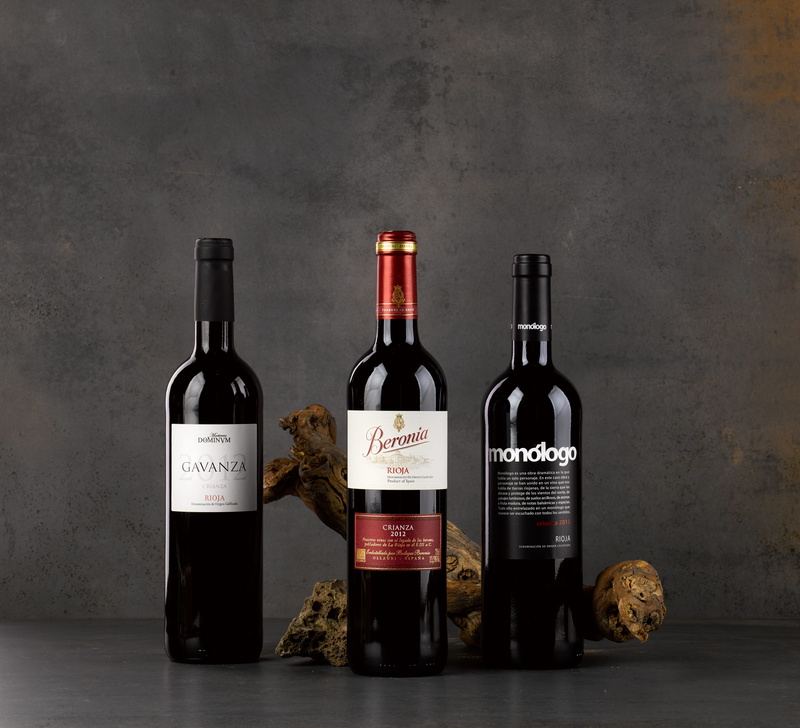 red wine, lot of wine, text, give away, choice, glass - material, food and drink, no people, drink, bottles of wine, bottle of wine, bottle, wine, still life