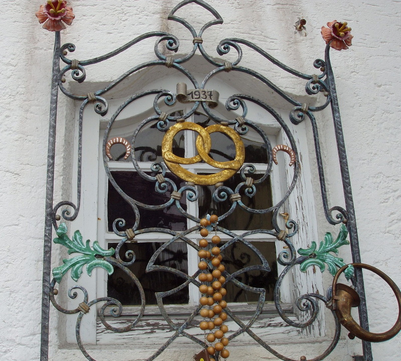 outdoors, metal, building, design, atmosphere, chain, security, wrought iron, no people, ornate, grid, protection, window grilles, curlicue, window, close-up